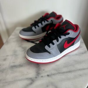 Kids Black and Red Nike Sneakers
